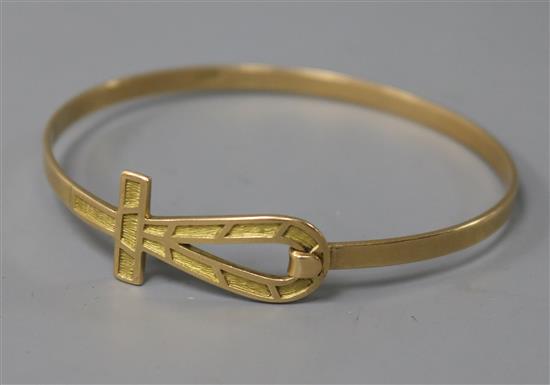 A Middle Eastern yellow metal bangle, 14.4 grams.